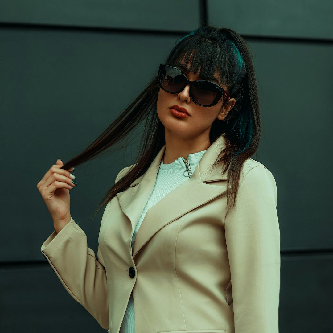 Professional Slovenian woman with brown hair smiling confidently